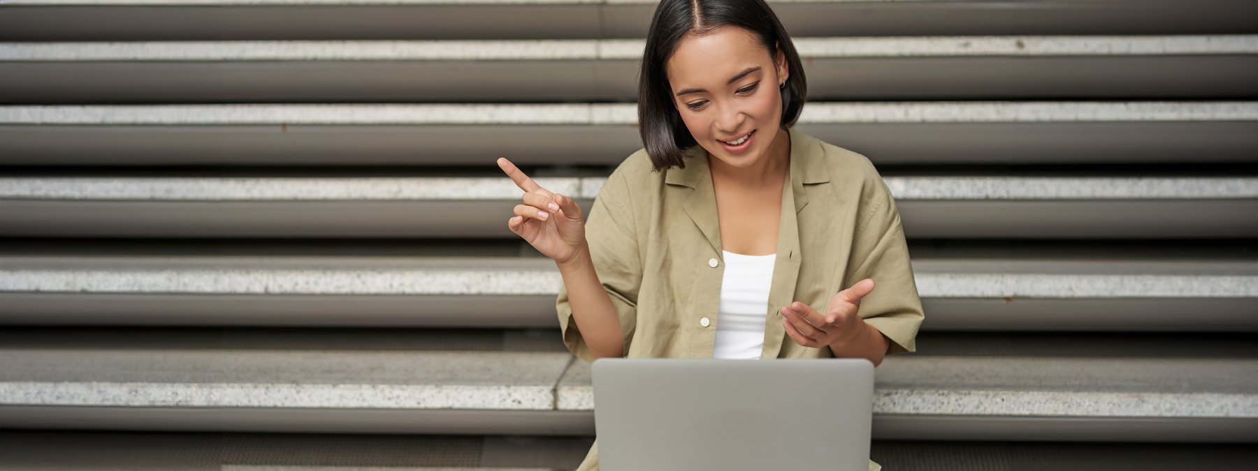 Person taking part in an online session on a laptop